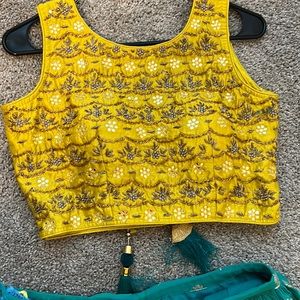 Embroidered yellow blouse with silk thread georgette lagenga and net chunni.